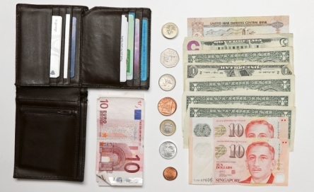 Packing for holidays. money Pic Robert Duncan 05 August  2014 Farfax online out